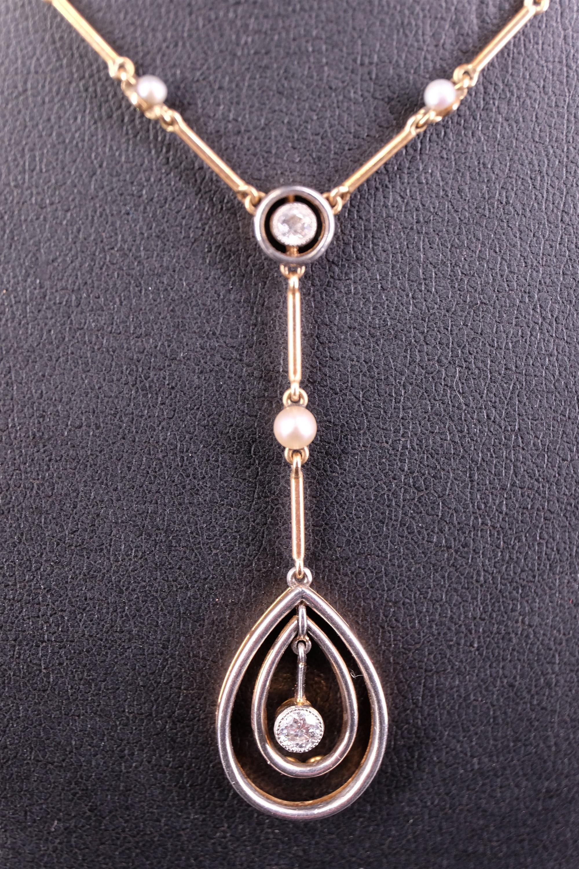 An early 20th Century diamond and seed pearl pendant necklace, comprising a round-cut diamond of - Image 3 of 10
