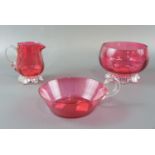 Three items of late 19th / early 20th Century free blown cranberry glass, tallest 9.5 cm