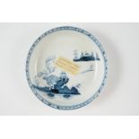 A 1758 - 1763 underglaze blue Richard Chaffers / Liverpool saucer in the Two Storey Shelter pattern,