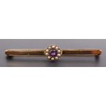 An early 20th Century pink tourmaline or similar gemstone, seed pearl and 9 ct yellow metal bar