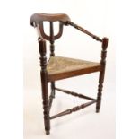 A 1920s reproduction 16th-17th Century turner's / caqueteuse chair