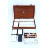 A quantity of art supplies comprising of a Winsor and Newton watercolour case, Winsor and Newton
