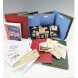 Six albums containing a collection of GB and world definitive and commemorative stamps together with