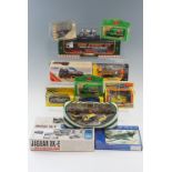 A group of boxed diecast cars and other vehicles, including a Corgi and a Corgi Classics Eddie
