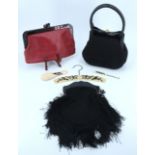 Two vintage handbags and a clutch bag, together with an Art Deco Ivorine dressing trio comprising