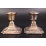 A pair of 1930s silver candle stands, 7 cm, loaded bases