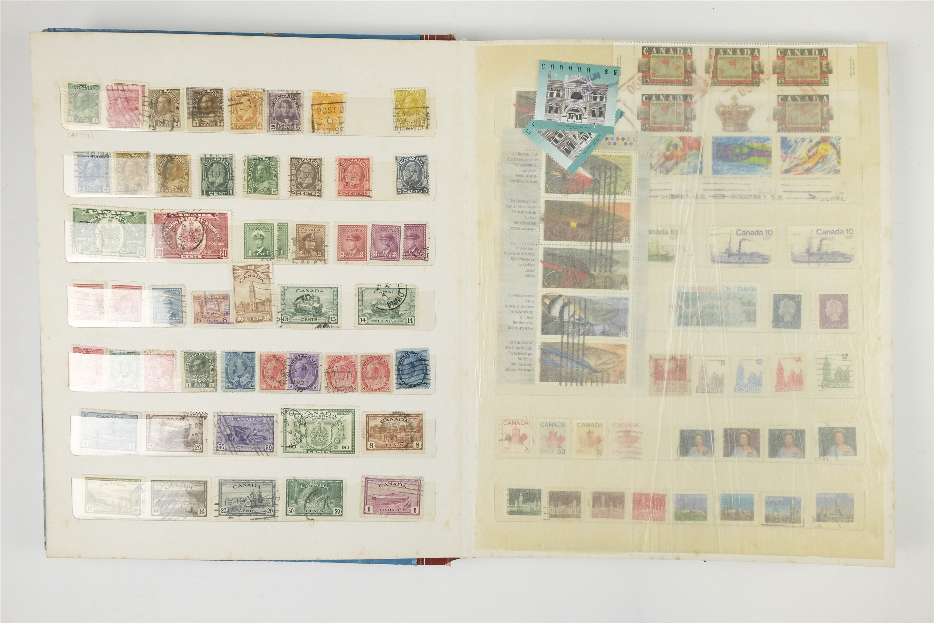Three hingeless albums containing a collection of USA and Canadian stamps together with a quantity - Image 17 of 47