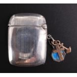 A 1920s silver watch chain fob vesta case, decorated with banded engine turning centred by a