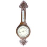 A 1930s carved oak banjo barometer, 76 cm (a/f)