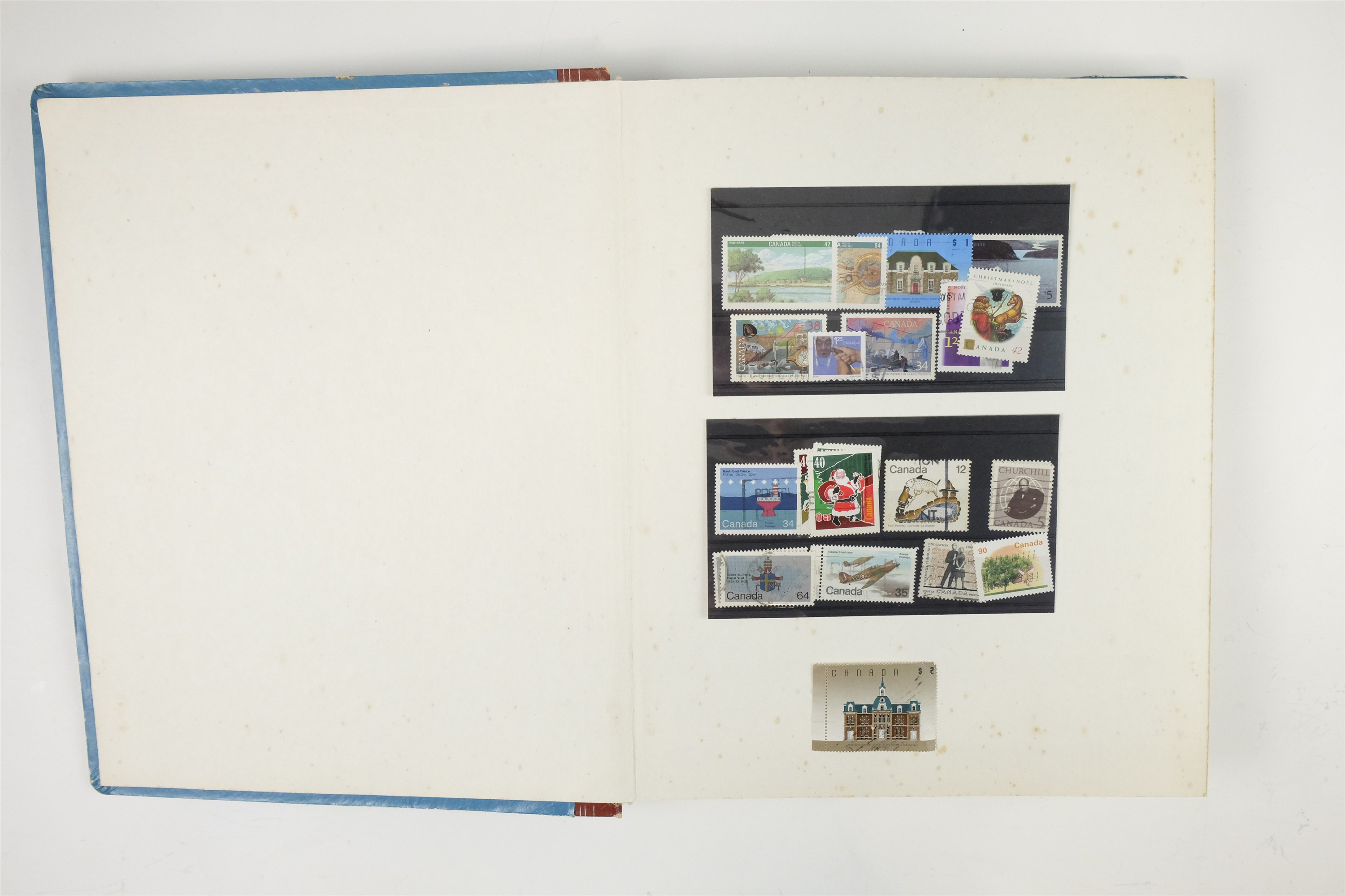 Three hingeless albums containing a collection of USA and Canadian stamps together with a quantity - Image 14 of 47