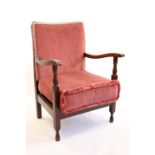 A 1930s child's upholstered open armchair, 73 cm
