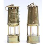 A presentation brass miniature miners safety lamp, Haig Colliery, 12 cm together with one other