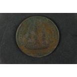 An 1812 British naval Halfpenny token, obverse a profile bust of Nelson with legend ENGLAND