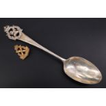 An Edwardian silver Liverpool Scottish commemorative or prize spoon, together with a related
