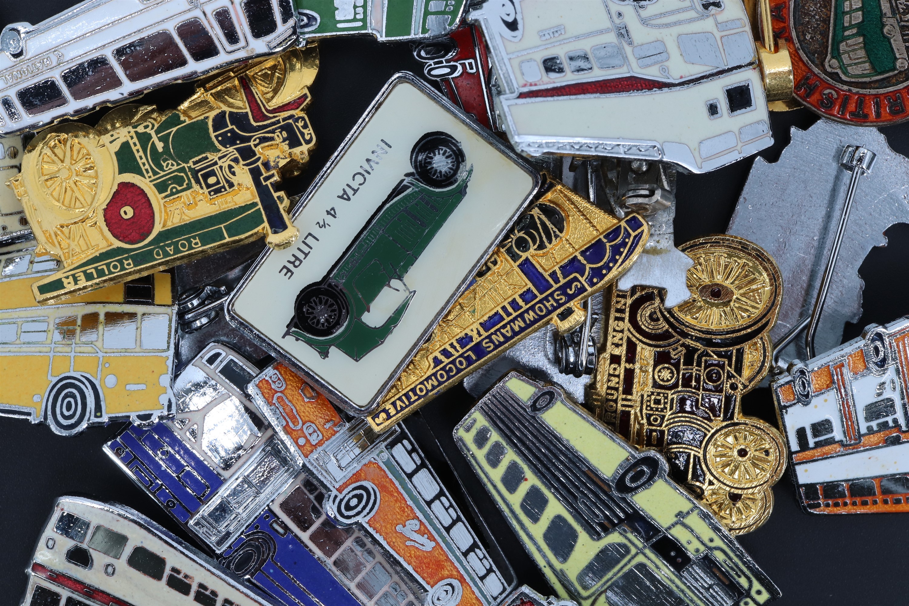 A collection of transport-related lapel badges, mid-to-late 20th Century