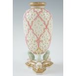 A late 19th Century Grainger Worcester porcelain reticulated vase, being of shouldered ovoid form