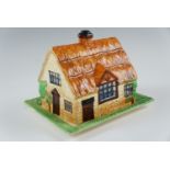 A Beswick Ware cottage butter / cheese dish and cover, 250, dish 20 x 17 cm