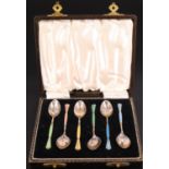 A cased set of six 1950s champlevé harlequin enamelled silver coffee spoons, having enamel