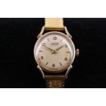 A 1950s lady's Tissot 9 ct gold wristlet watch, having a 15-jewel movement and circular face with
