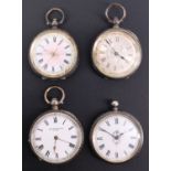 Four late 19th / early 20th Century ladies' white metal cased fob watches, (a/f)
