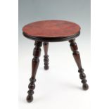 A late Victorian turned three-legged stool, 28 cm x 35 cm