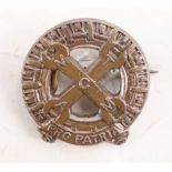 A Second World War Mechanised Transport Training Corps bronze lapel badge