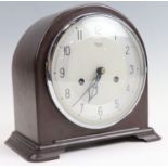 A 1930s Smiths Enfield Bakelite clock, 22 cm x 20 cm