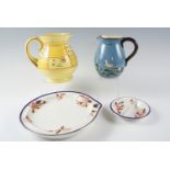 A Crown Devon jug together with a Booth's warming plate, a Bude jug and a dish, 13 cm