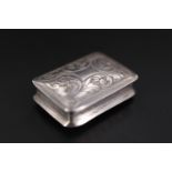 An early Victorian silver vinaigrette, cushion-shaped with cavetto sides, foliate and foliate-scroll