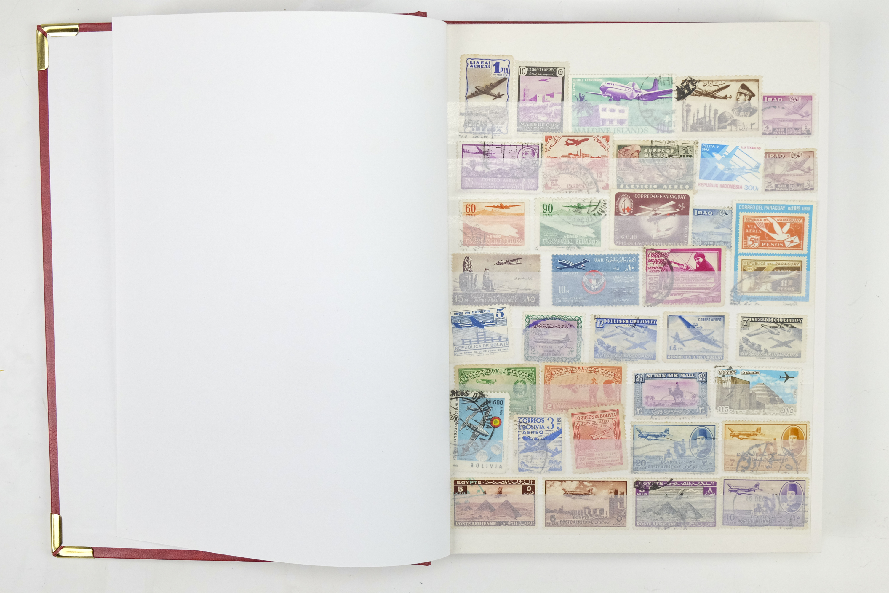 Five hingeless albums of world stamps, including an album of aircraft commemoratives, India, Cuba, - Image 4 of 53
