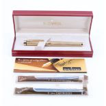 A 1970s cased Sheaffer gold electroplated fountain pen, having a Sheaffer "14K" nib, together with