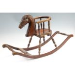 A small child's wooden rocking horse, 73 cm long