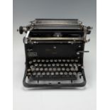A German Third Reich Continental A typewriter with SS runic key