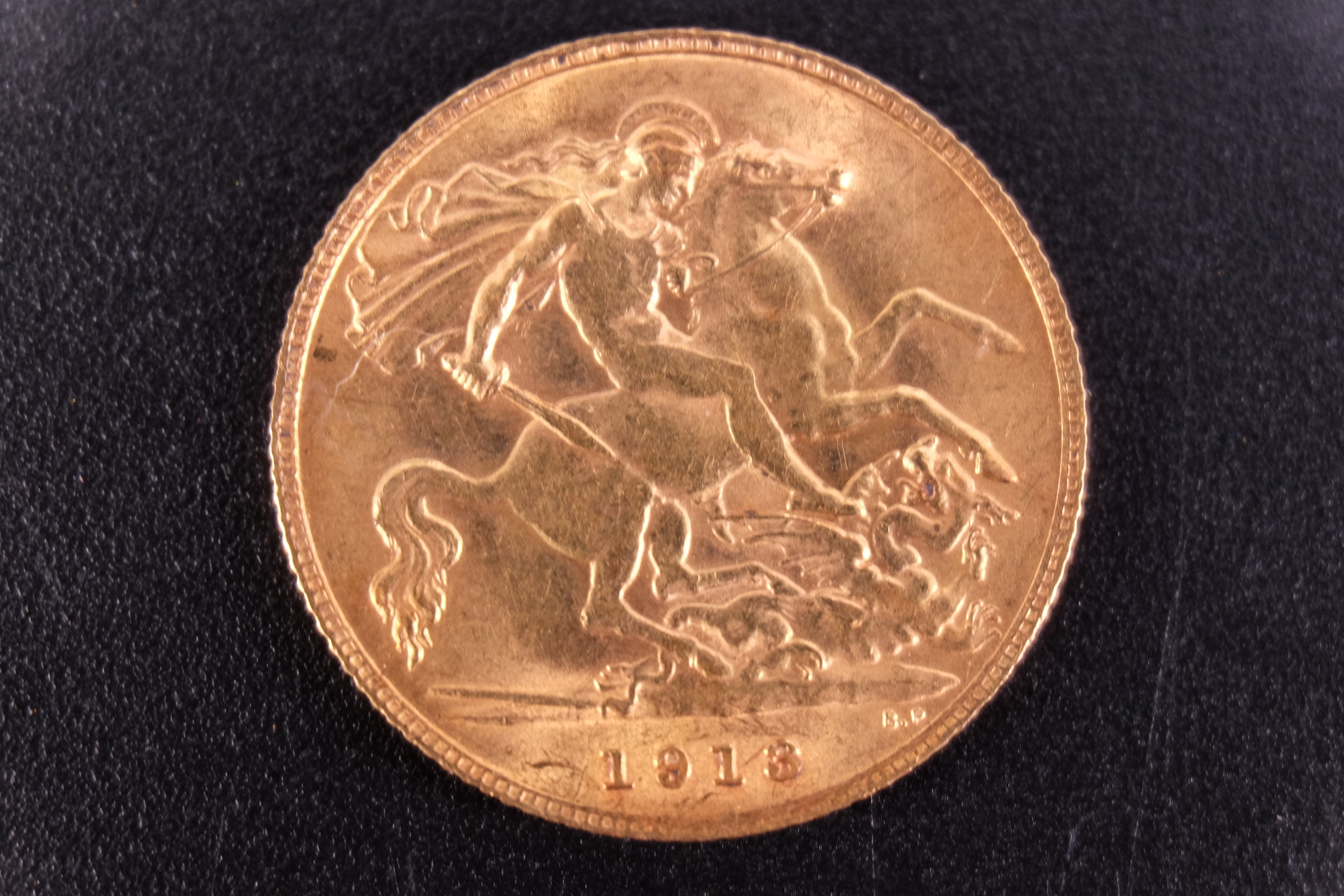 A 1913 gold half sovereign