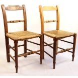 A pair of Victorian rush-seated kitchen chairs