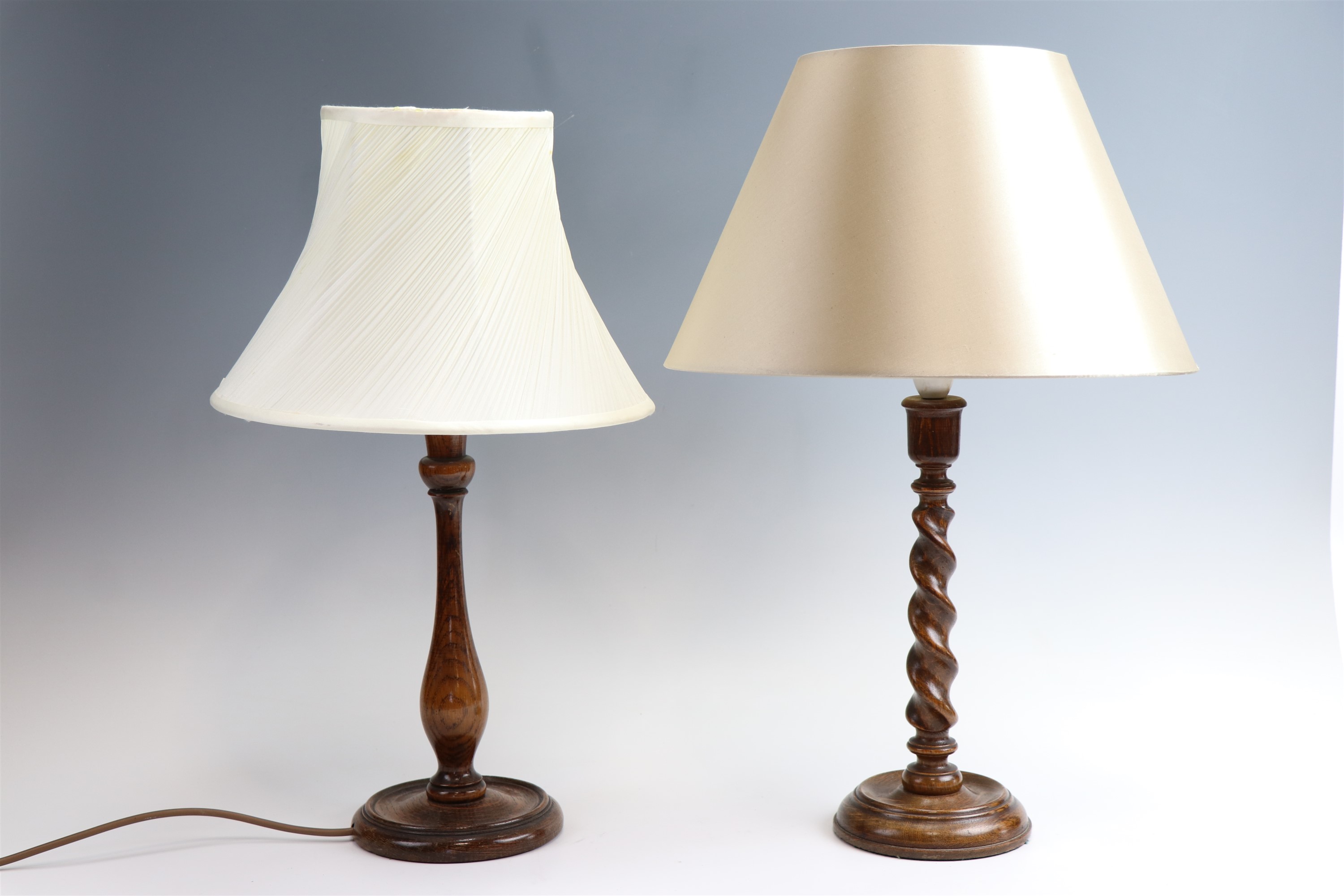 Two turned wood table lamps, one having a barley twist stem, tallest 38.5 cm to socket