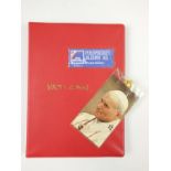 A hingeless album of Poste Vaticane (Vatican) stamps and other religious commemorative stamps
