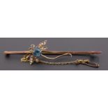An early 20th Century blue paste, seed pearl and 9 ct yellow metal dragonfly bar brooch, 75 mm, 4.