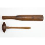 A vintage hardwood lead bossing stick together with an associated turned hardwood mallet, former