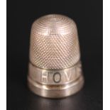 A silver "Hovis Bread" thimble by Henry Griffith & Sons, Chester