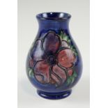 A Moorcroft Anemone pattern vase, impressed and printed marks to the base, 10 cm