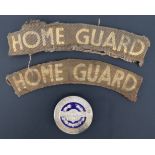 A Second World War Bradford Home Guard Proficiency enamelled arm badge and printed shoulder titles