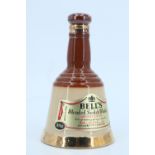 A Bells Blended Scotch Whiskey decanter, 16 cm (unopened)