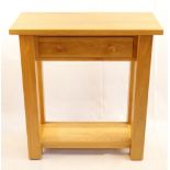 A contemporary blonde oak side table, 73 cm x 33 cm x 77 cm