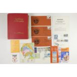 A loose leaf album containing a collection of world stamps, including German Third Reich,