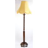A twist-turned oak standard lamp, circa 1930s, 150 cm