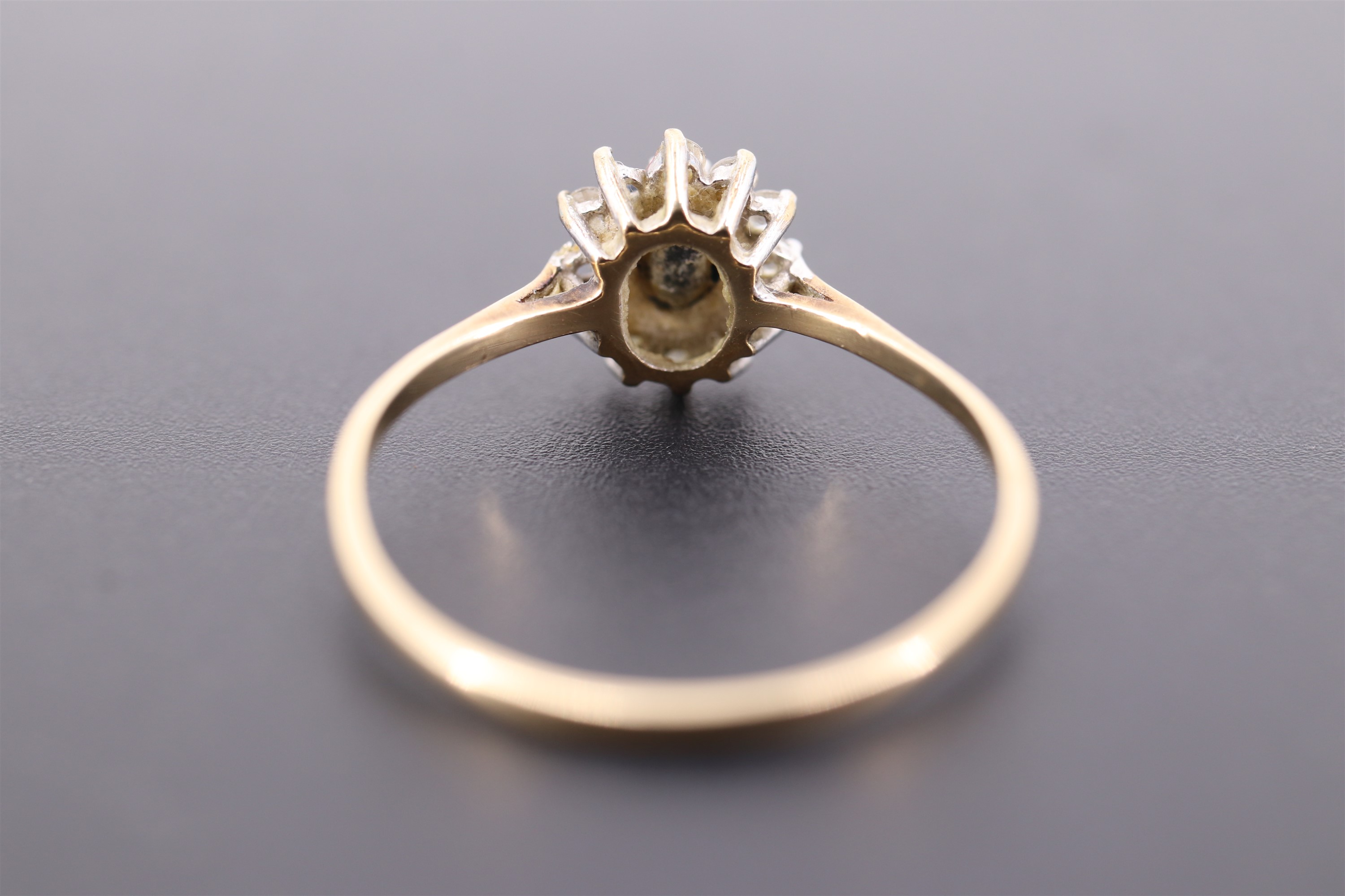 A sapphire, white paste and 9 ct gold flowerhead cluster ring, the oval sapphire of approx 0.3 ct, - Image 3 of 4