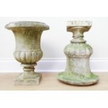 A pair of stone campana form garden urns, 57 cm x 36 cm x 36 cm