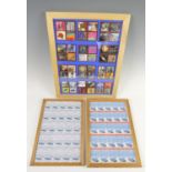 A framed display of GB commemorative stamps together with two framed "Auto 100" stamp sheets, former