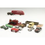A group of vintage Dinky, Tri-ang and other diecast toy cars, including a Blaw Knox Bulldozer, a